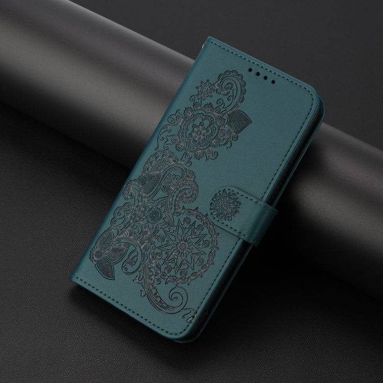 For iPhone 16 Datura Flower Embossed Flip Leather Phone Case(Dark Green) - iPhone 16 Cases by PMC TechLife | Online Shopping South Africa | PMC TechLife | Buy Now Pay Later Mobicred